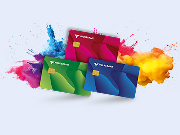 Die Teenscard der Volksbanken in Rot, Grün und Blau. Im Hintergrund der Karten passiert eine Farbexplosion.